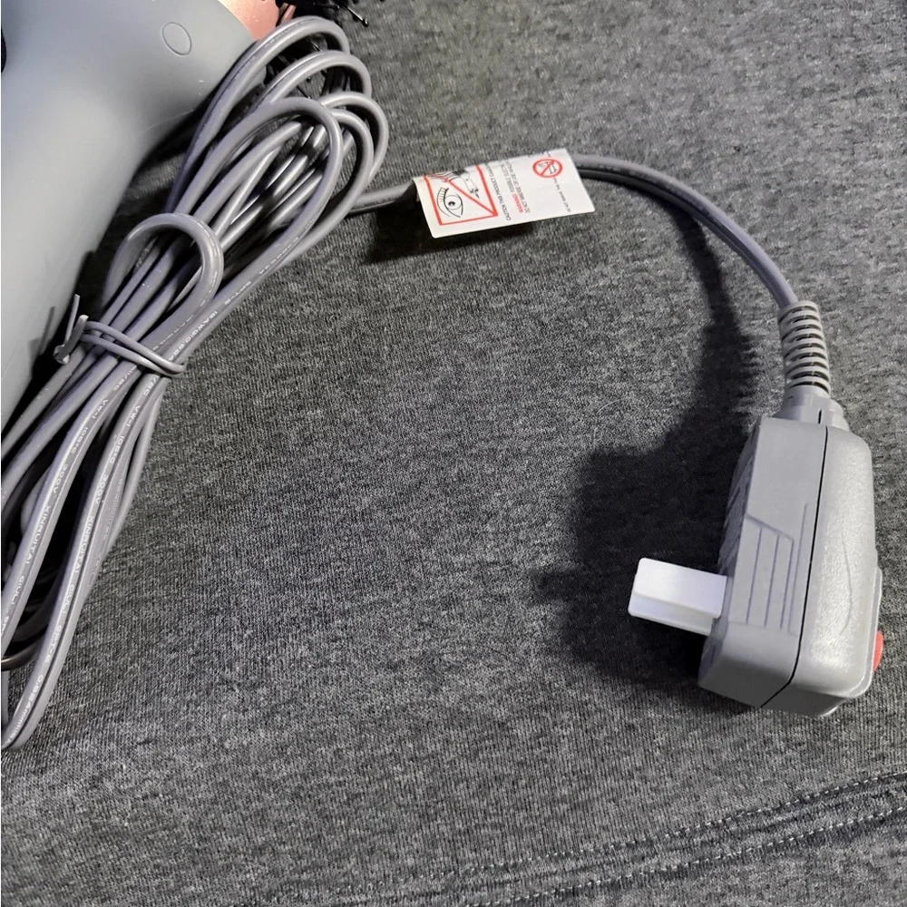 Sleek Pink and Gray Hair Dryer Brush